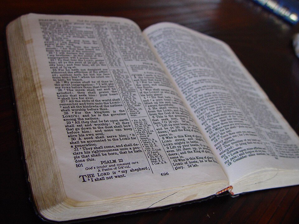 Real photograph: an open Bible at the Lateran Baptistery — public domain An open Bible photographed inside the Lateran Baptistery, representing a quiet place for prayer